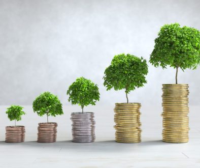 Stacks of coins arranged in a bar graph, Saving money concept